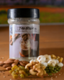 Instant Vital Roots Talbina powder in a jar with 15 ingredients, including dry fruits and nuts, sugar-free and preservative-free, perfect for a quick Barley Porridge or Talbina Recipe.