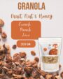 "Granola with fruits, nuts, and honey in a bag with cereal flakes and oatmeal pieces scattered on a surface"
