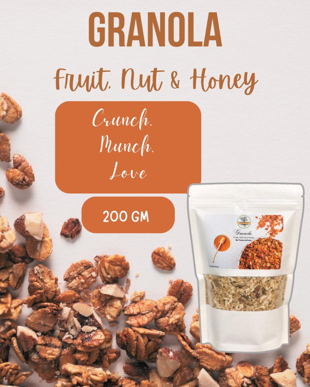 "Granola with fruits, nuts, and honey in a bag with cereal flakes and oatmeal pieces scattered on a surface"