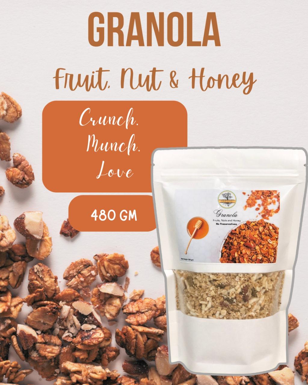 "Granola with fruits, nuts, and honey in a bag with cereal flakes and oatmeal pieces scattered on a surface"
